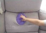 Cleaning Your Couch with a Pot Lid