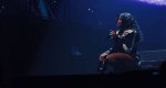 Dive Deep into Sza's Towering Presence