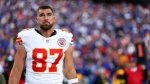 Travis Kelce Leaves Chiefs Game in '1989' Outfit with Taylor Swift